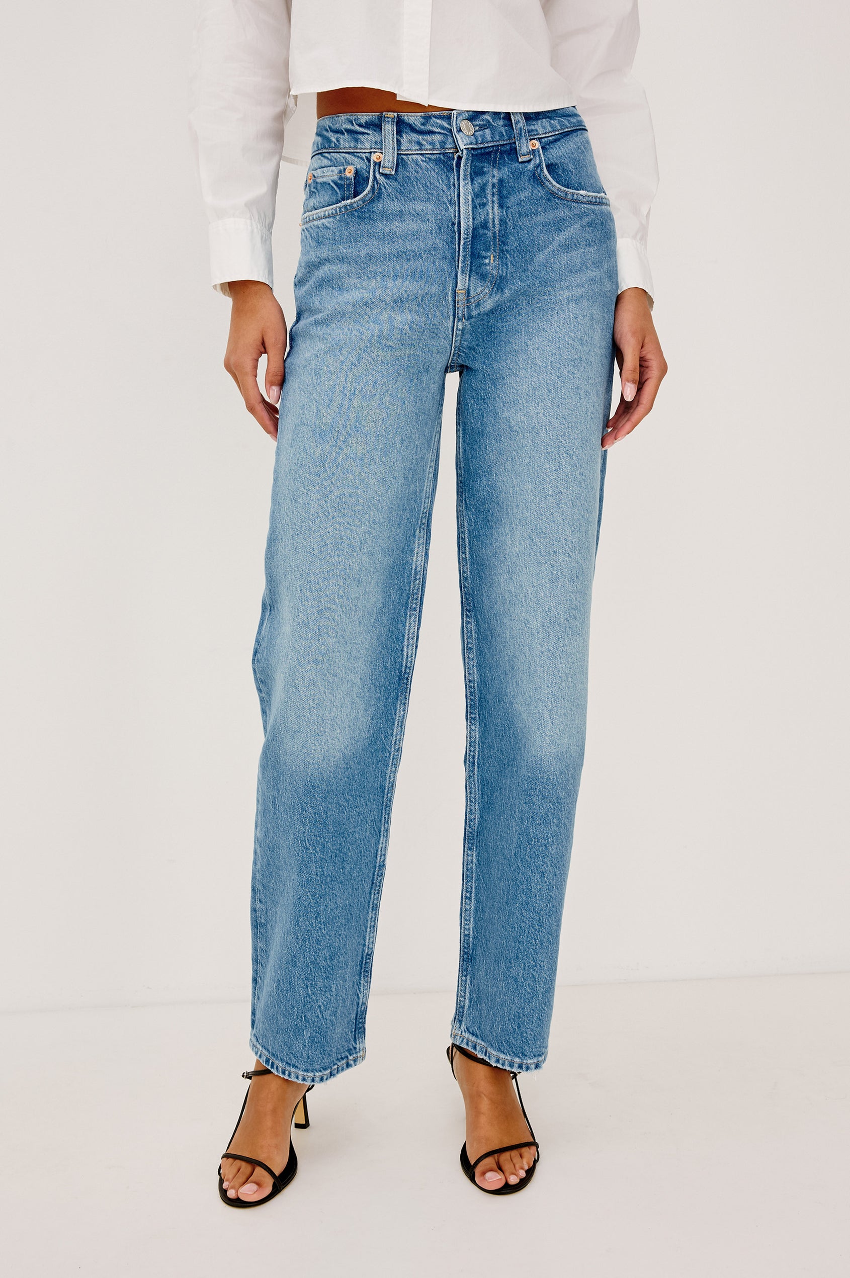 Topanga High-Rise Wide Straight Leg Jean in With 5-Pockets and a Front Zip-Fly in Baja Blue Colorway - Front View Featured on Model