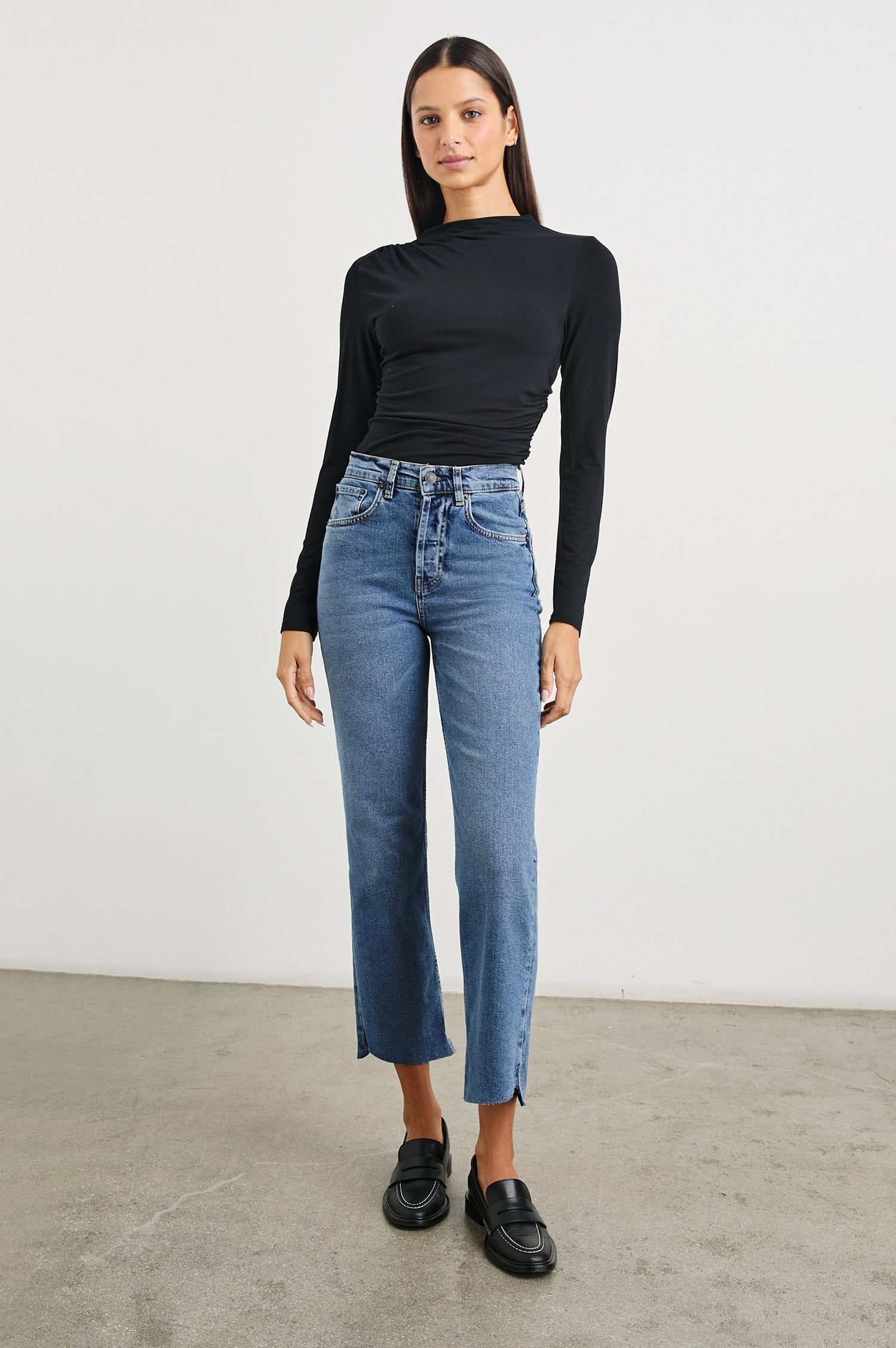 Topanga Crop Straight Jeans with an Asymmetrical Crop, Belt Loops, Two Front Pockets plus a Coin Pocket and Two Back Patch Pockets in Pure Indigo Colorway - Front Full Body View Featured on Model