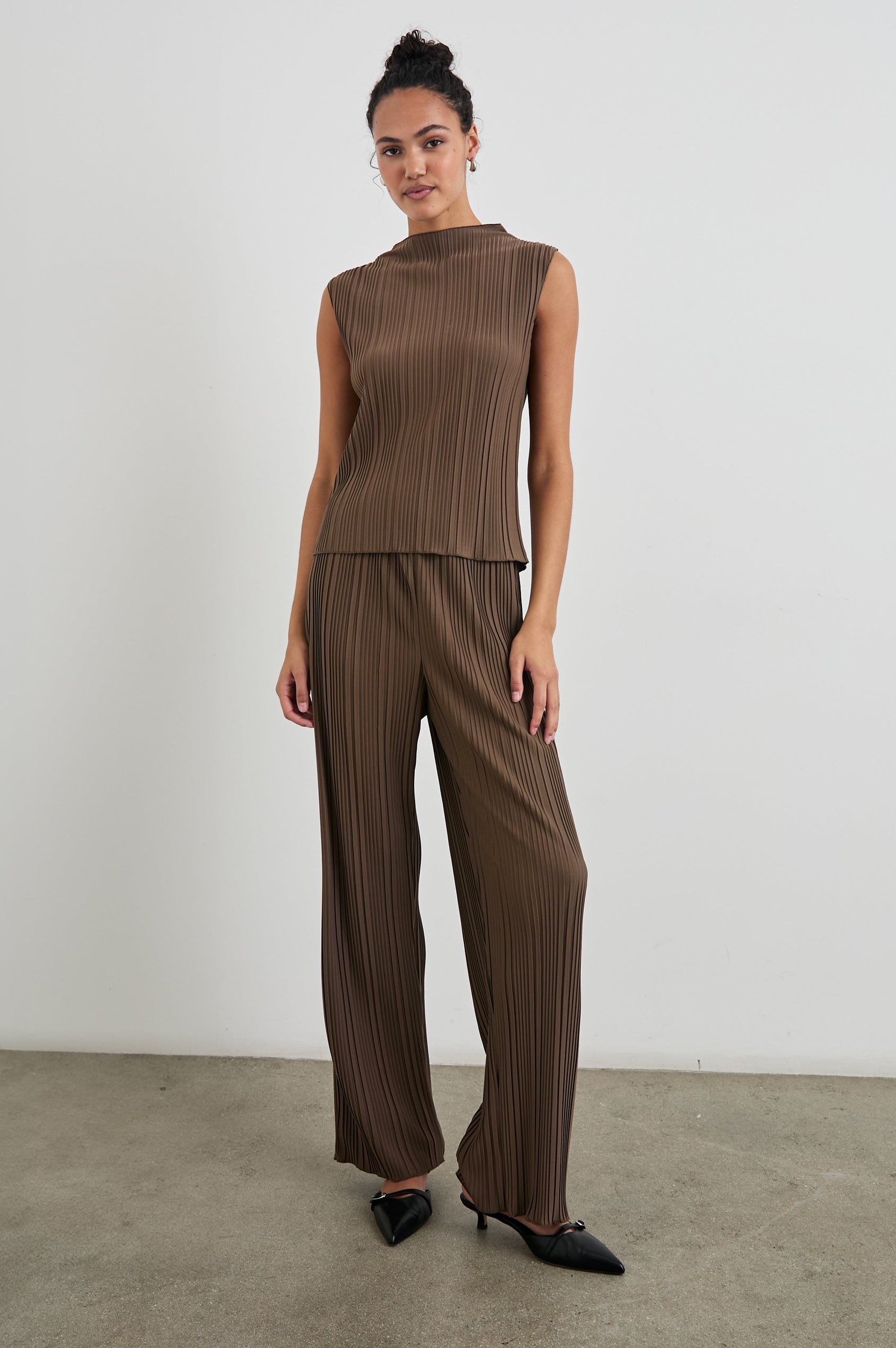 Trea Sleeveless Top with a Mock Neck and Pleated Texture in Morel Colorway - Front Full Body View Featured on Model