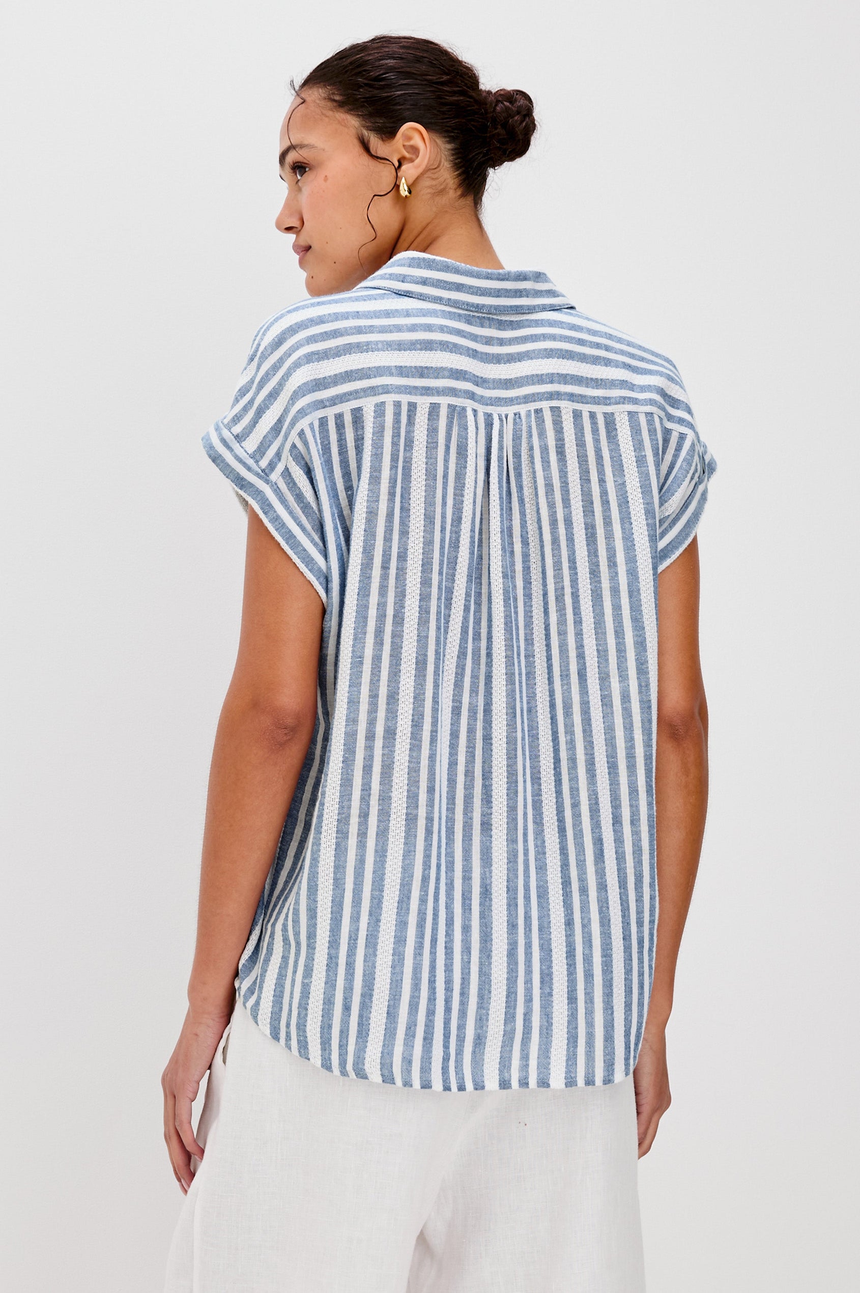 Tuscany Collared Half Button Front Shirt with Rolled Cuff Short Sleeves in Blue and White Jalisco Stripe Colorway. Back View Shown on Model.