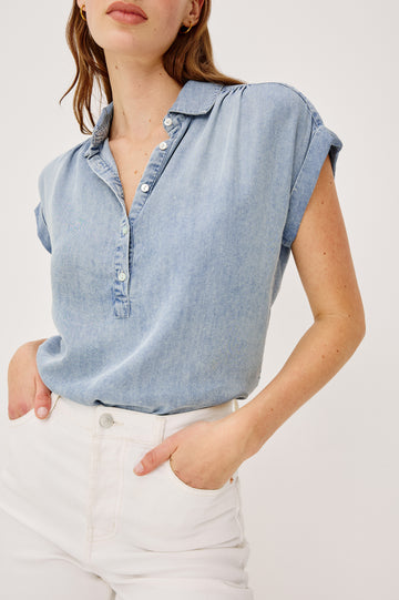 Tuscany Top in Luxe Linen With Relaxed Fit, Cuffed Cap Sleeves, Collar, Half Front Placket in Washed Blue Colorway - Upper Body View Featured on Model