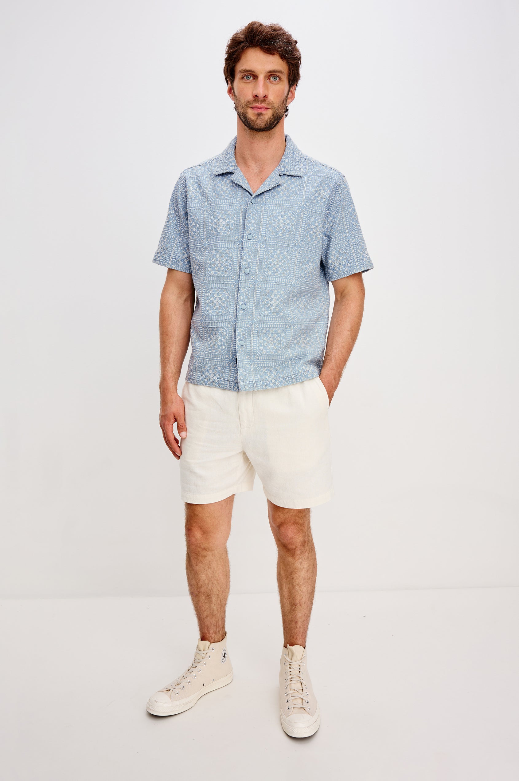 Tyler embroidered short sleeve button up with collar in Indigo Cream Squares colorway - front full body view featured on model