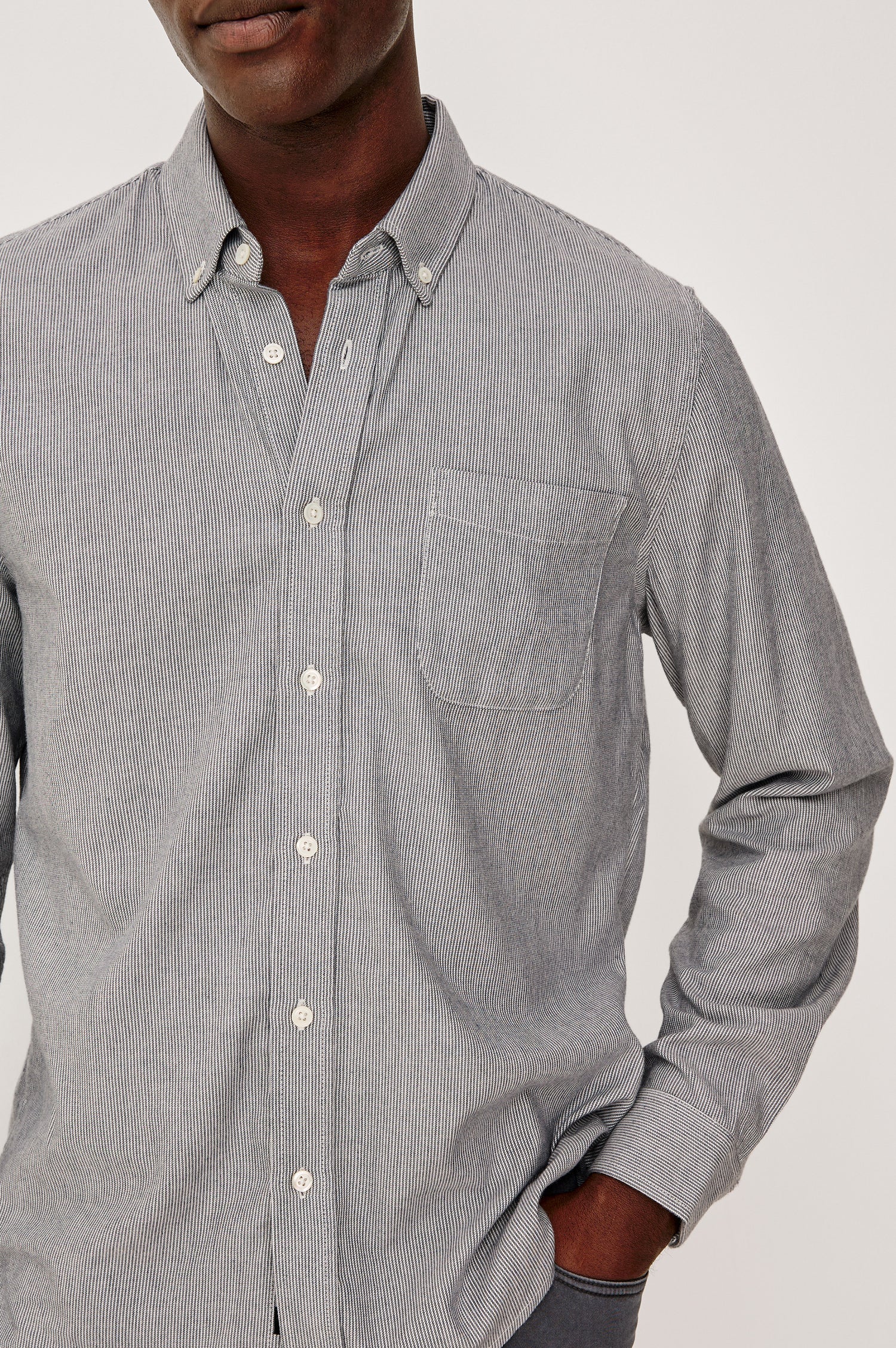 Vance Button Front Collared Shirt With Long Sleeves and Single Chest Pocket in Navy Rope Stripe Colorway - Upper Body Front Close Up View Featured on Model