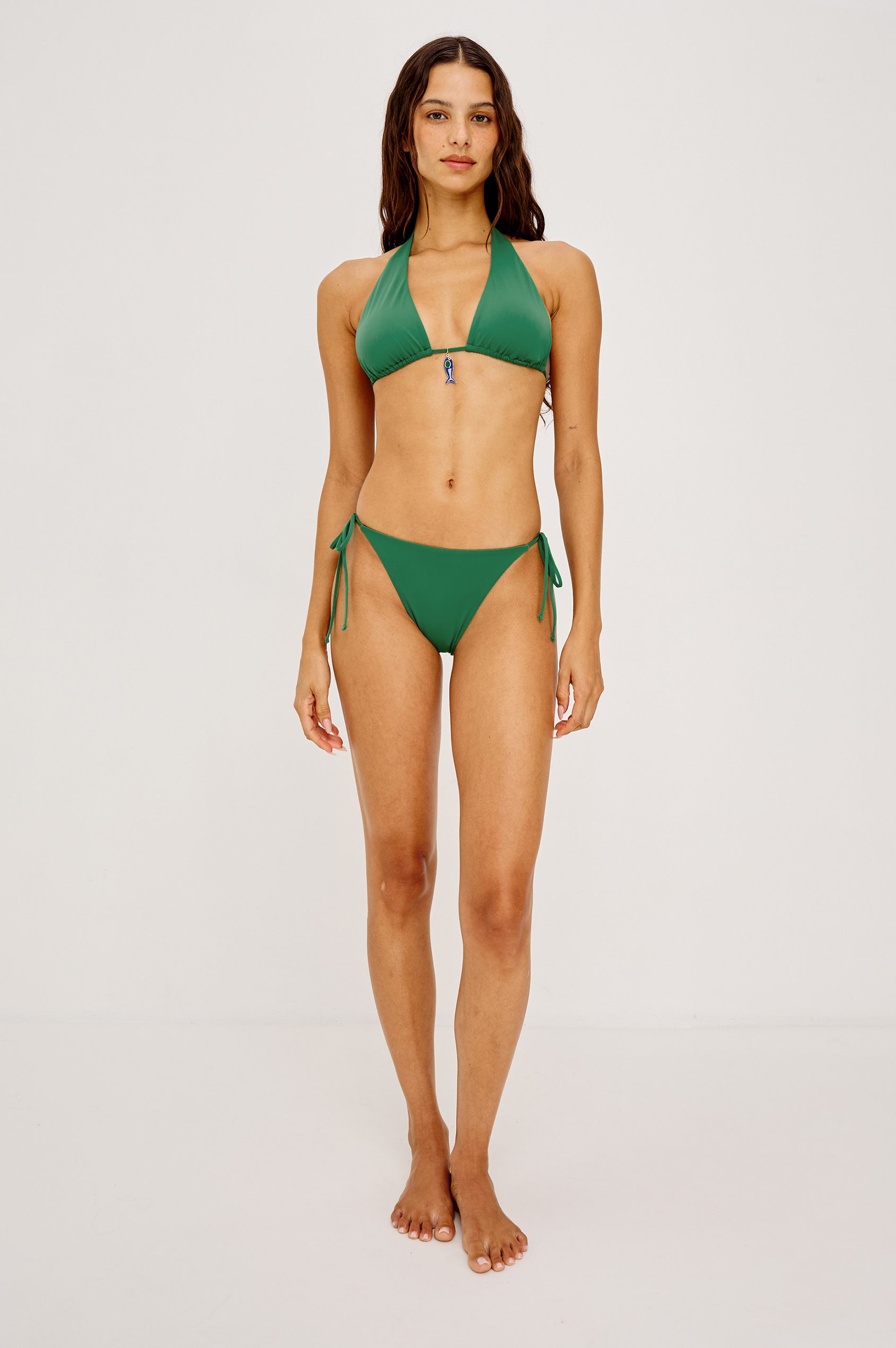 Veracruz Bikini Top With Adjustable Halter and Back Ties and Fish Charm at Center Bust in Clover Colorway - Full Body Front View Featured on Model