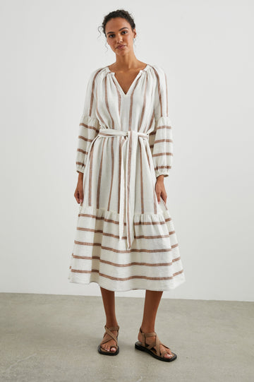 Vittoria Midi Dress with Three-Quarter Sleeves, a V Neck, Light Ruching at the Collar, and a Fabric Tie Belt in Coconut Stripe Colorway, Coconut Vertical Stripes on White with Horizontal Stripes at the Hem - Front Full Body View Featured on Model