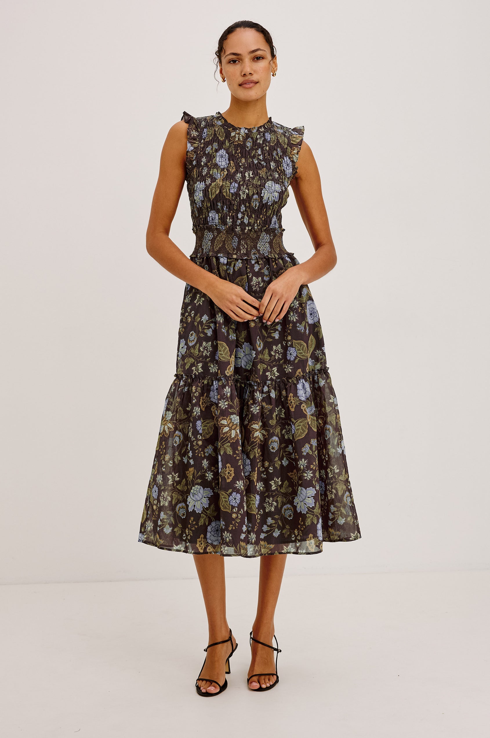 Vivier Midi Dress in Soft Voile With Shirred Fitted Bodice and Waistband, Back Keyhole Cutout With Button-Loop Closure, Lined Single-Tiered Skirt, and Ruffle Trim in Willow Colorway - Full Body Front View Featured on Model
