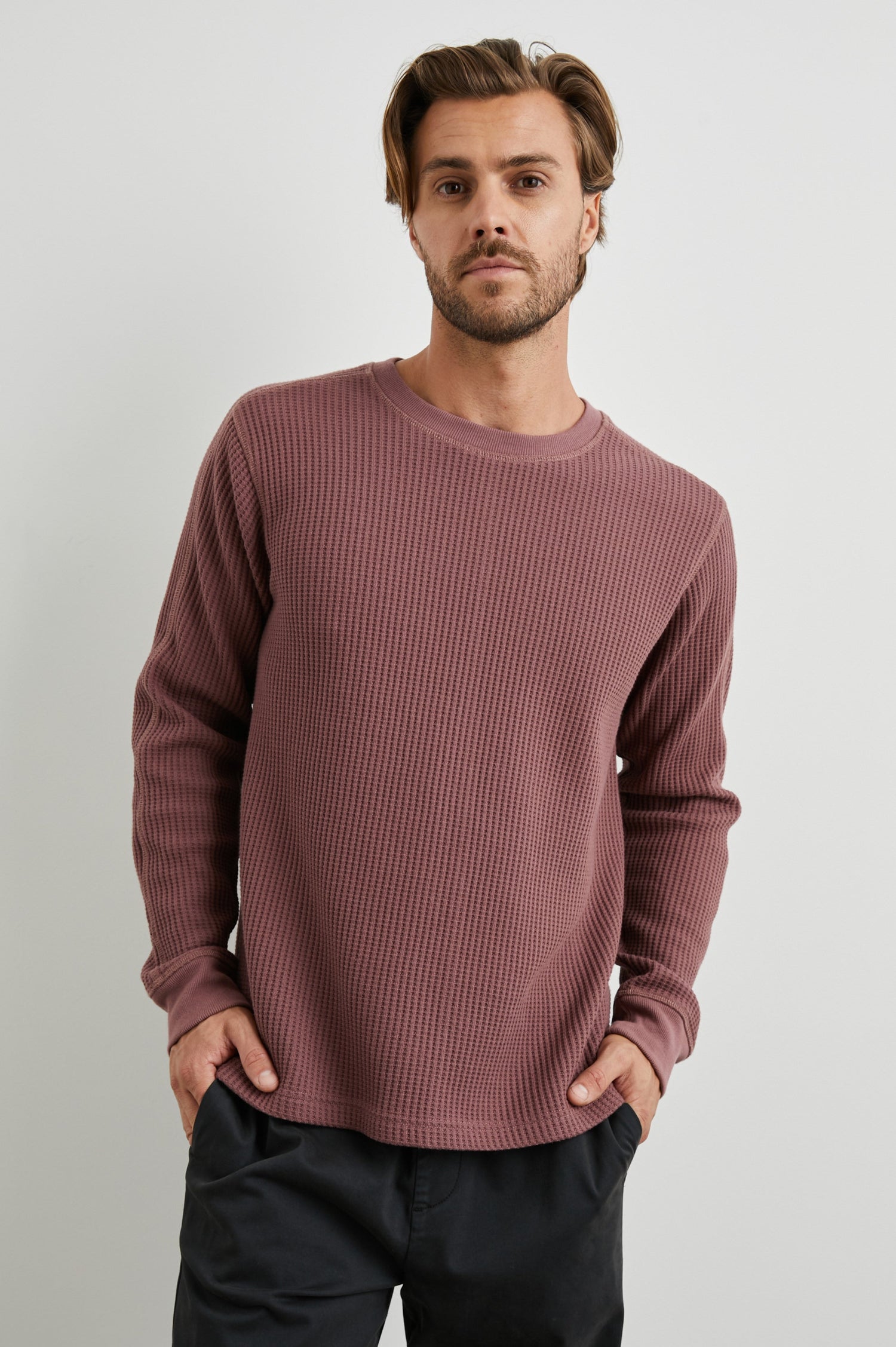 Wade Long-Sleeve Waffle Knit Thermal with a Crew Neck in Brick Colorway - Front View Featured on Model