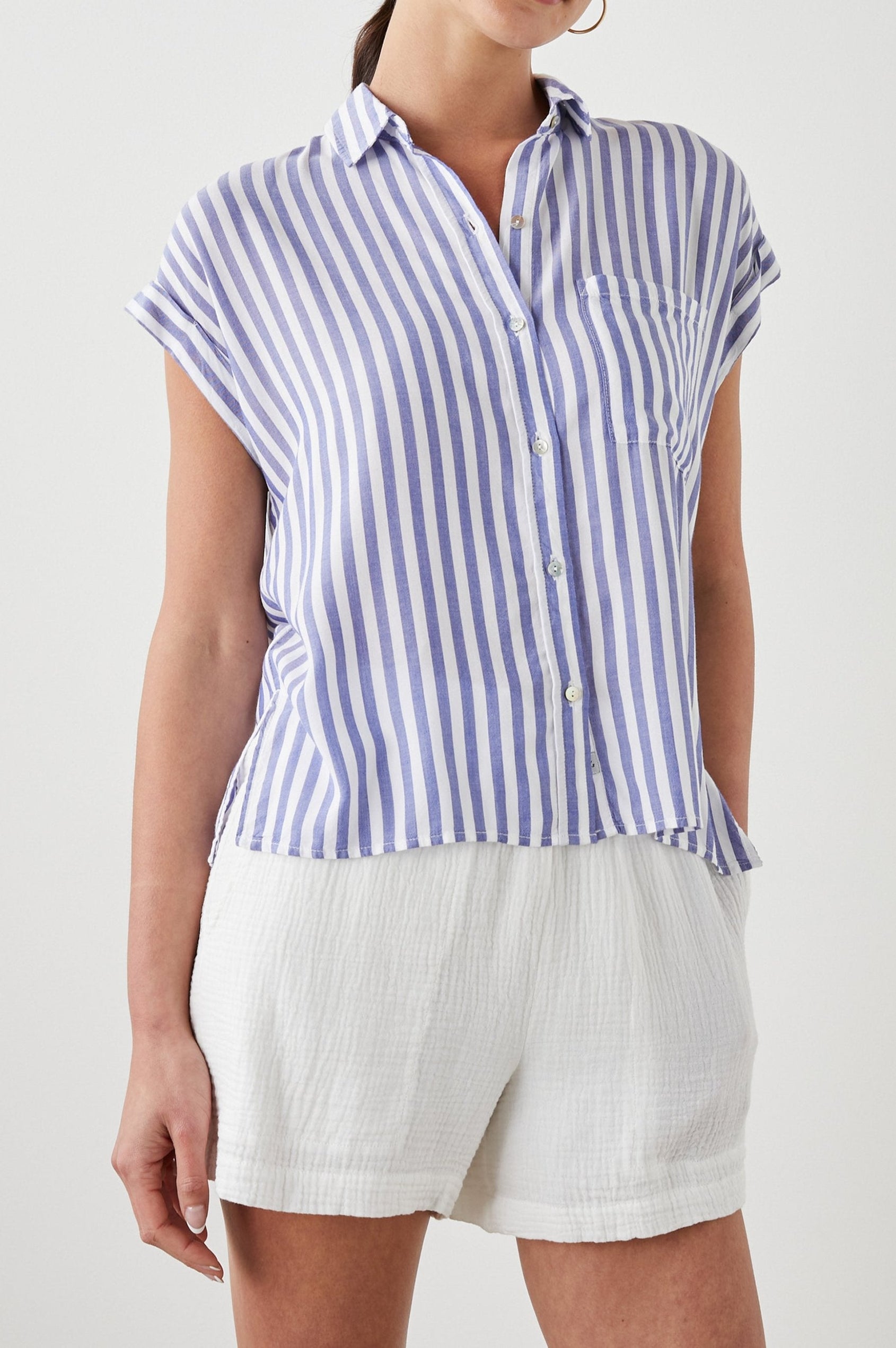 Whitney Short Rolled Sleeves Button Up with a Chest Patch Pocket and Short Side Slits in Blue White Stripe Colorway, with vertical stripes - Front View Featured on Model
