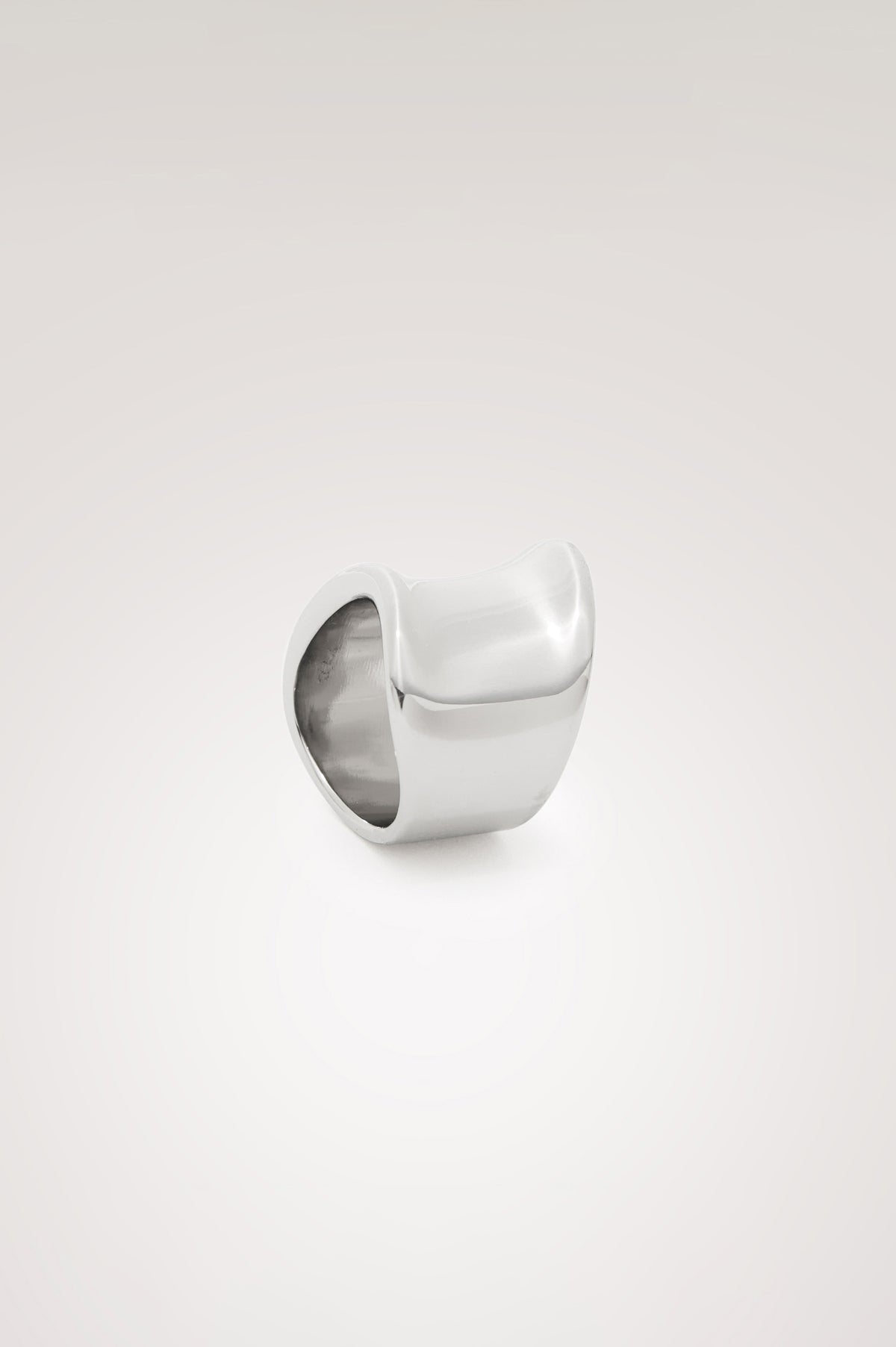 Curved Ring Gold-Toned With Wide Band and Engraved Rails Logo at Interior in Silver Colorway - Side View Featured