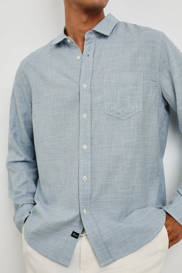 Wyatt Long-Sleeve Relaxed Fit Button Up with a Chest Patch Pocket in Tidal Etch Colorway - close up of details on model