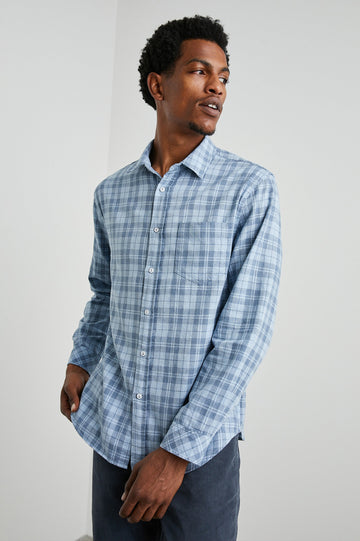 Wyatt Long-Sleeve Button Up with a Chest Patch Pocket in Sky Demin Heather Colorway, a plaid - Front View Featured on Model
