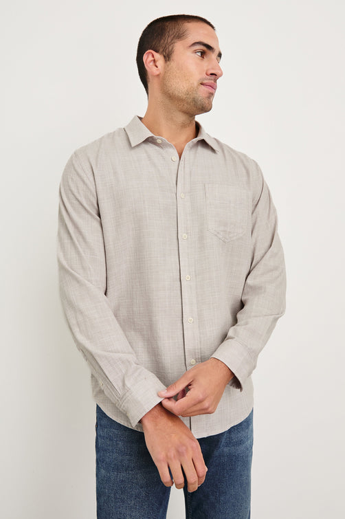 Wyatt Classic Button Up Long Sleeve Shirt in Tahini Etch - front view on model, hands in front