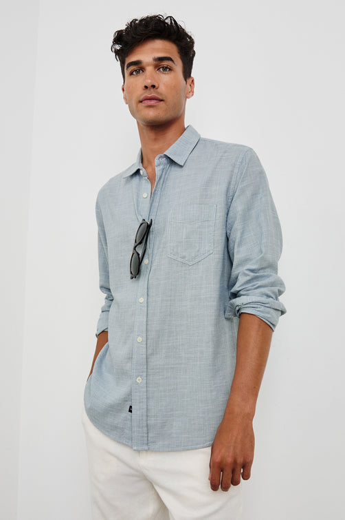 Wyatt Classic Button Up Long Sleeve Shirt in light blue Tidal Etch - Front view on Model with sleeves rolled up