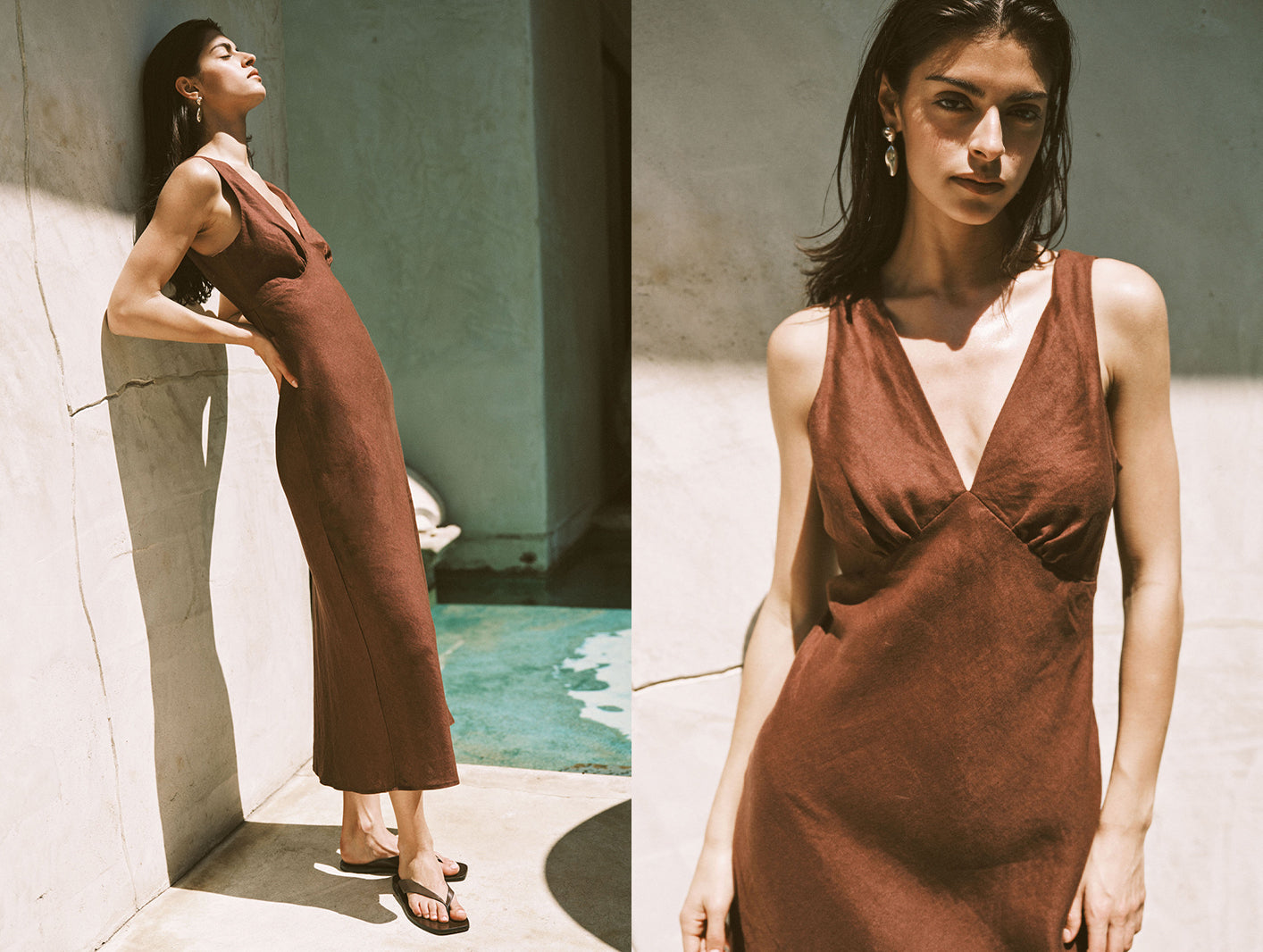 Woman wearing a rust-colored dress standing by a poolside.