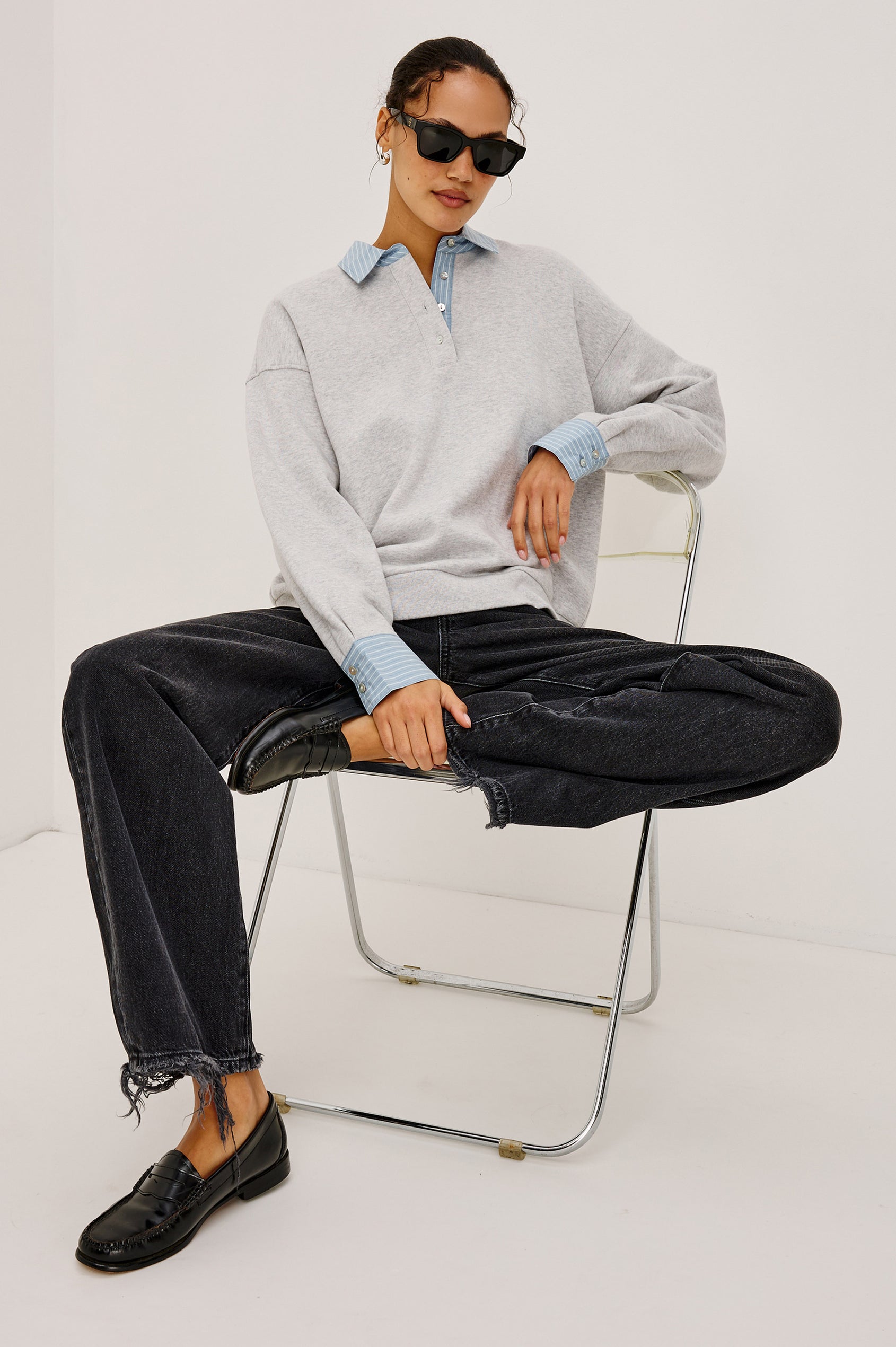 Zavier Sweatershirt in French Terry in Relaxed Slightly Cropped Fit, Contrast Poplin Collar and Cuffs, Quarter-Button Placket, and Ribbed Hem in Heather Grey Colorway - Full Body Featured on Model Sitting