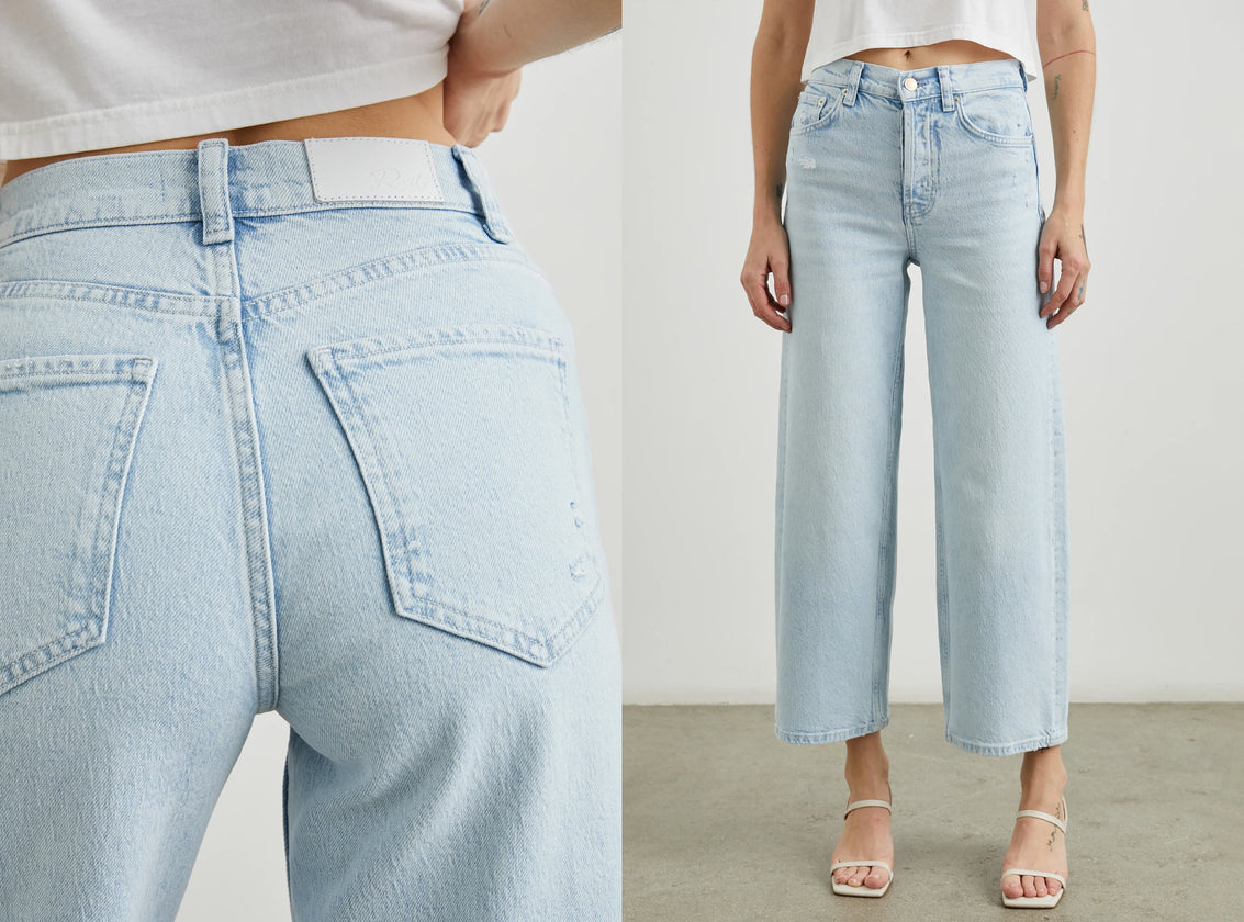 TWO SIDE BY SIDE IMAGES. FIRST IMAGE IS BACK DETAIL IMAGE OF GETTY CROP WIDE LEG JEANS IN OCEAN BREEZE DISTRESS. SECOND IMAGE IS FRONT IMAGE OF MODEL WEARING GETTY CROP WIDE LEG JEANS IN OCEAN BREEZE DISTRESS.
