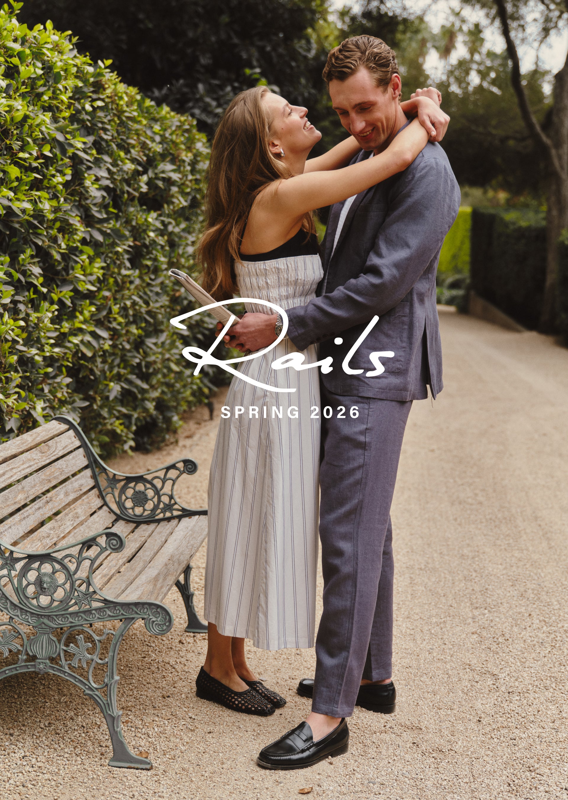 Couple hugging on a path with 'Rails' branding and 'Spring 2026' text.