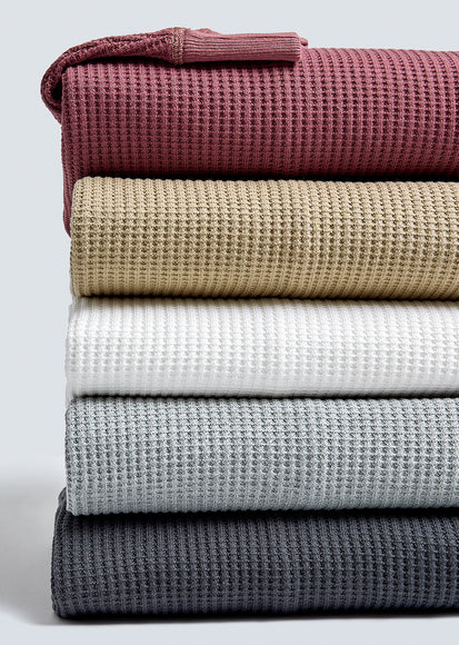 MULTIPLE WADE THERMALS FOLDED AND STACKED ON TOP OF EACH OTHER