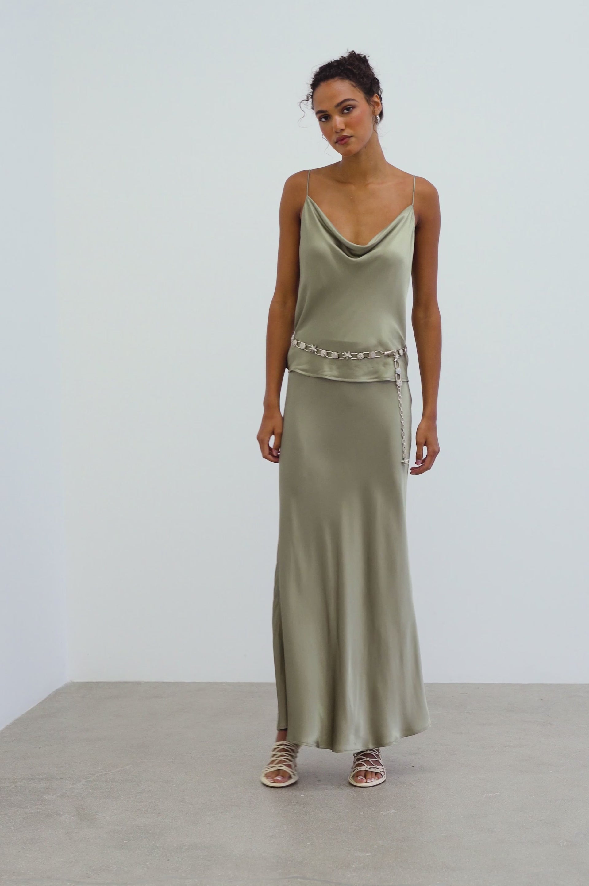 Model wearing the Romina Skirt in Mermaid, a long skirt