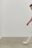 (Video): Men's Hardy polo shirt in light blue melange, shown on a model to demonstrate the breathable knit fit - front full body view featured on model.