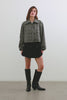 (video) North Cropped Jacket with Button Closure, Puff Sleeves, Oversize Collar, a Toggle Hem, Two Front Pockets and a Horizontal Back Vent in Teal Multi Check Colorway, a Black, Tan and Teal Plaid - Front Full Body View Featured on Model
