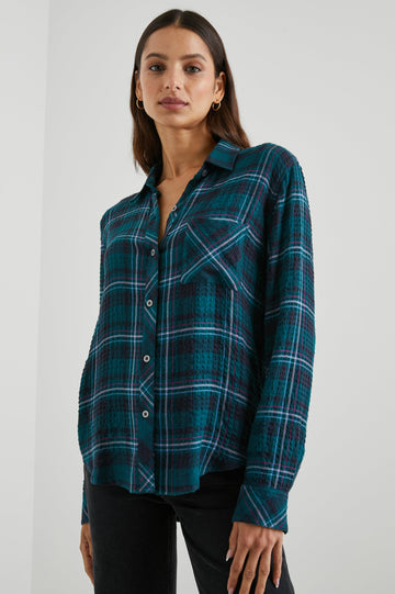 Brady Long-Sleeve Button Up with a Chest Patch Pocket and Textured Fabric in Pine Fuchsia Colorway, a Plaid in Pine, Fushia, Blue and Grey - Front View Featured on Model 