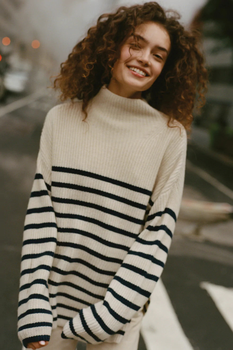 Claudia Cream Navy Stripe Mock Neck Sweater- NYC editorial