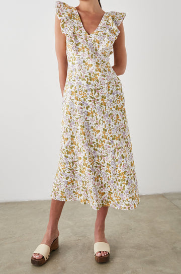 Constance Short Sleeve Midi Dress with Flutter Sleeves, a V Neck, and Cross Ties Across the Mid to Upper Back in Tansy Colorway, Brown, Orange, Purple, Pink and Green on White - Front Full Body View Featured on Model 