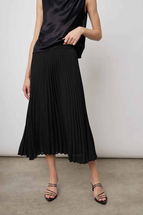 DELPHINE BLACK SKIRT- FRONT IN MOTION