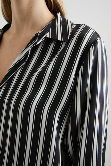 Dorian Long-Sleeve Button Up in Melrose Stripe Colorway, Black and White Vertical Stripes  - Front Tucked View Featured on Model
