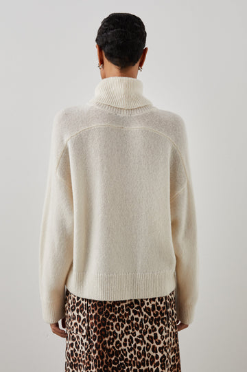 Estelle Long-Sleeve Turtleneck Sweater with Ribbed Trim in Ivory Colorway - Back View Featured on Model 