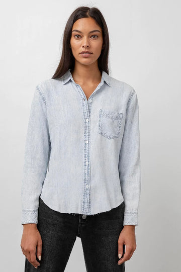 Ingrid Raw Hem, Long Sleeve Denim Button Up with a Chest Patch Pocket in Light Acid Wash Colorway - Front View Featured on Model