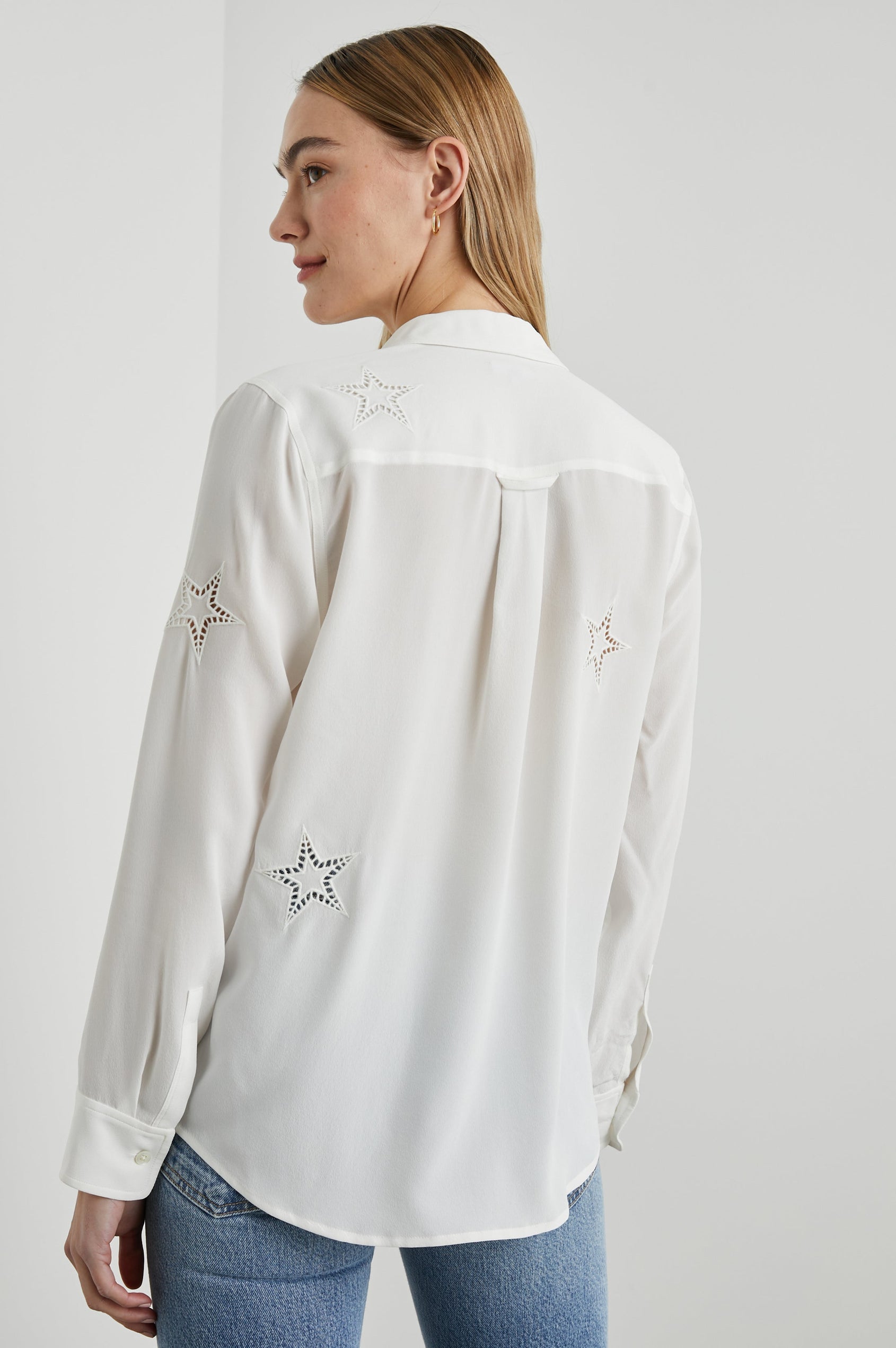 Kate Long Sleeve Button up with a Chest Patch Pocket and Eyelet Stars in Ivory Eyelet Stars Colorway  - Back View Featured on Model