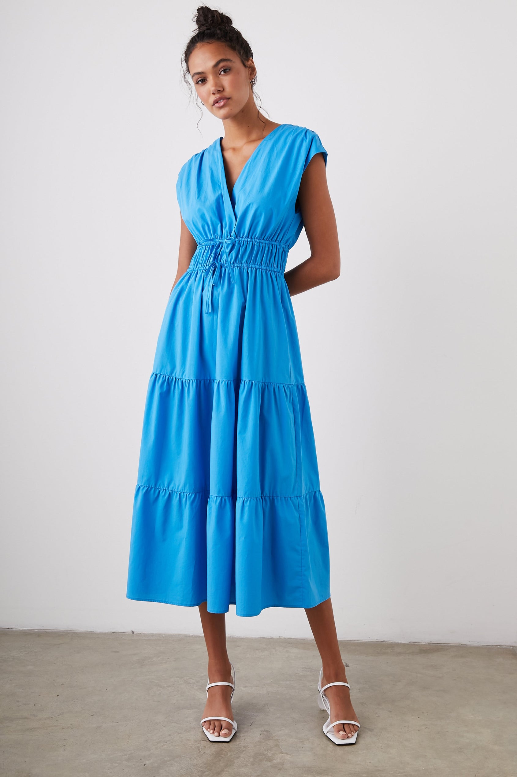 Lucia Midi Dress with Cap Sleeves, a Crossover V neckline, an Elastic Waist with Ties, and a Tiered Skirt in Pacific Colorway - Front Full Body View Featured on Model