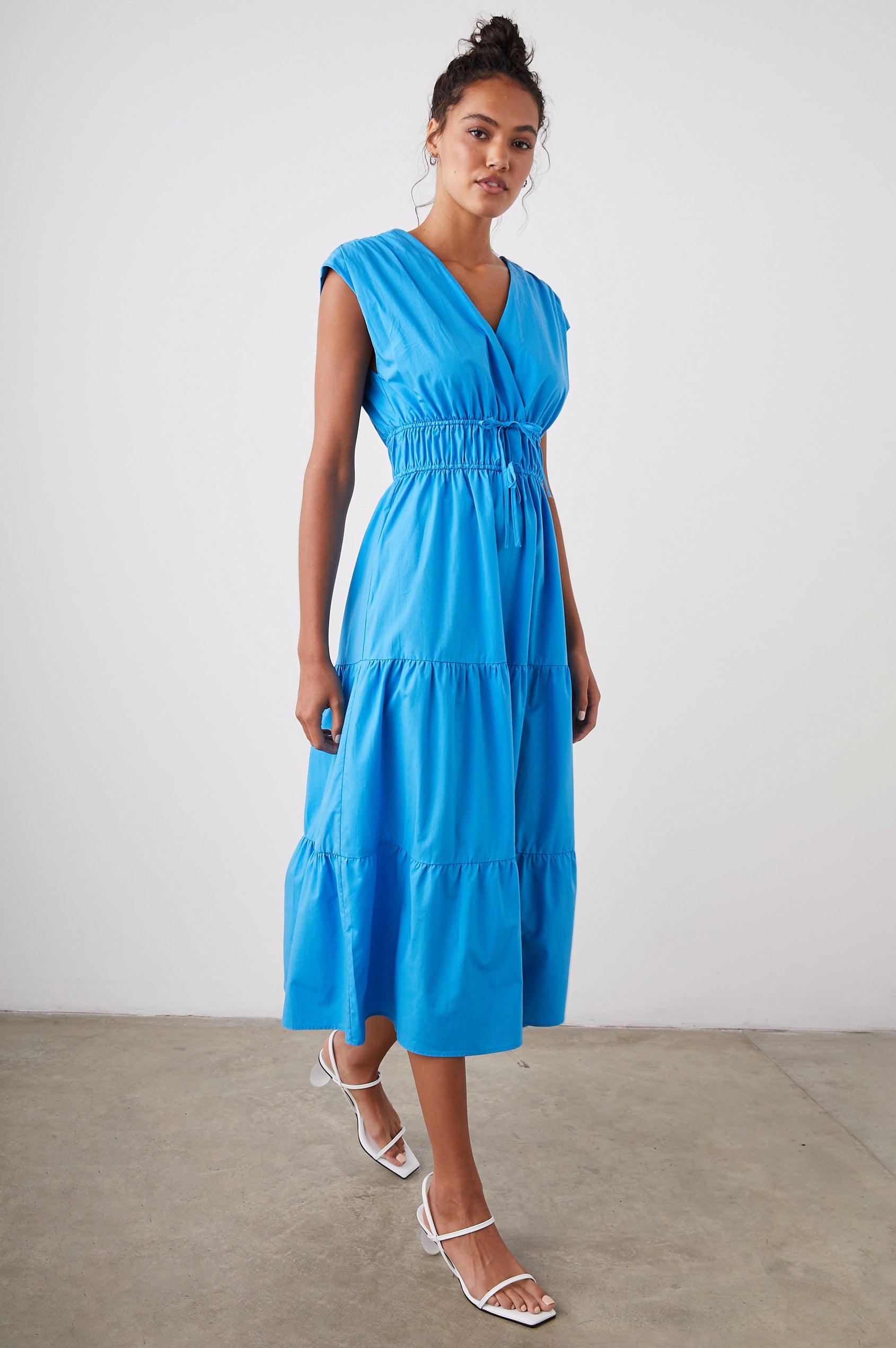 Lucia Midi Dress with Cap Sleeves, a Crossover V neckline, an Elastic Waist with Ties, and a Tiered Skirt in Pacific Colorway - Front Full Body View Featured on Model