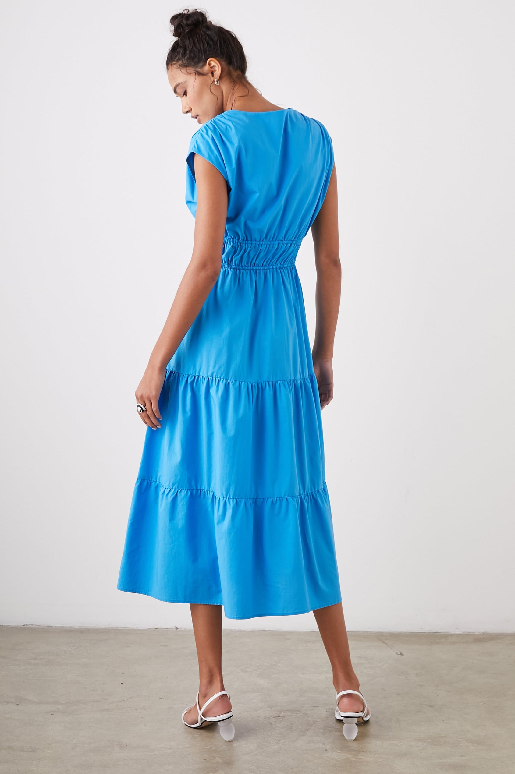 Lucia Midi Dress with Cap Sleeves, a Crossover V neckline, an Elastic Waist with Ties, and a Tiered Skirt in Pacific Colorway - Back Full Body View Featured on Model