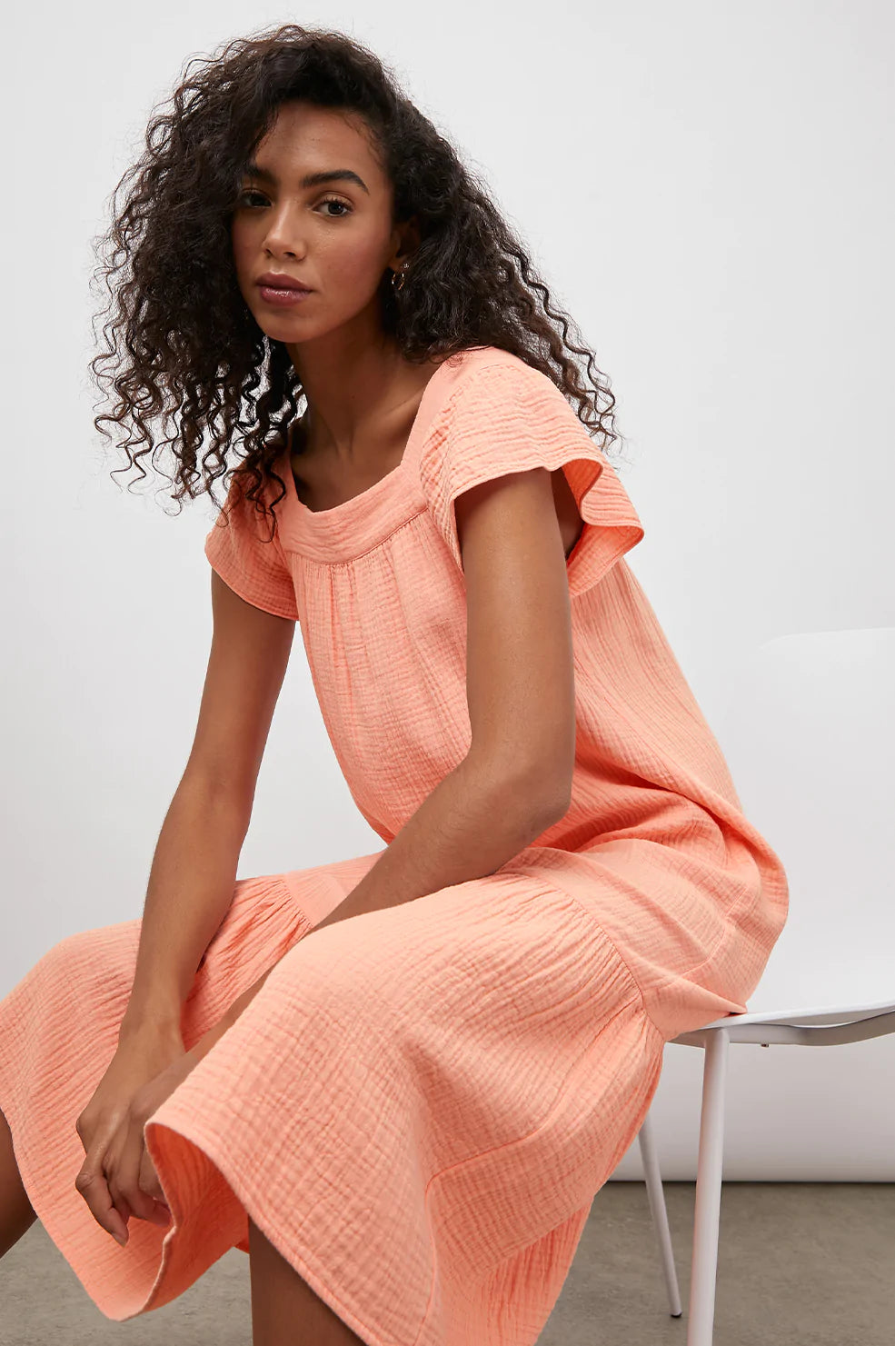 SKYLAR PEACH AMBER DRESS-FRONT SITTING DOWN