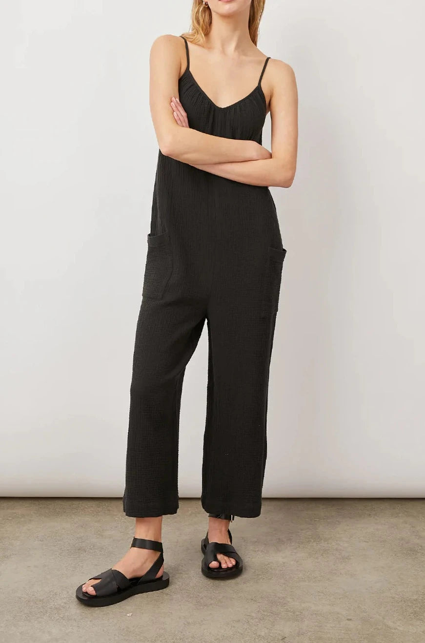 TUCKER BLACK JUMPSUIT-FULL FRONT BODY ARMS CROSSED