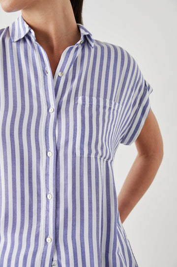 Whitney Short Rolled Sleeves Button Up with a Chest Patch Pocket and Short Side Slits in Blue White Stripe Colorway, with vertical stripes - Front View Featured on Model